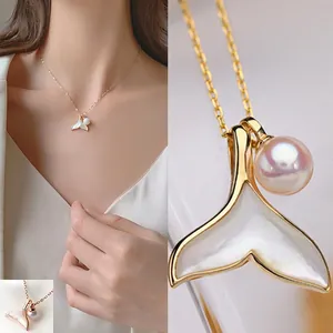 Elegant 14k gold plated fishtail pendant necklace with white shell inlay and round pearl