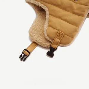 Detail of warm winter hat showing thick sherpa fleece lining and durable canvas fabric