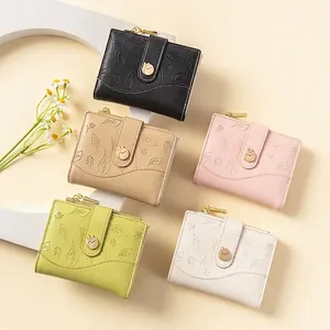 Short PU leather bi-fold wallets for women with leaf embossing in five elegant colors