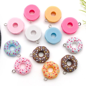 Colorful resin donut charms with sprinkles and metal loops for DIY jewelry making crafts
