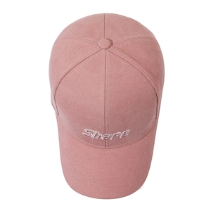 Pink cotton baseball cap with white Share letter embroidery in a classic 6-panel design