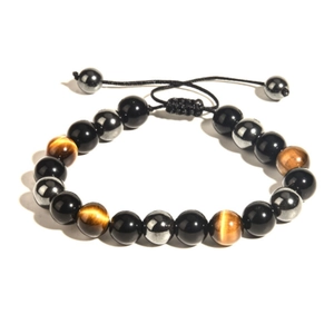 Adjustable tiger eye beaded bracelet with matte black and hematite stones on white background