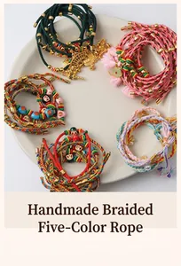 Flat lay of colorful handmade woven bracelets with various beads in a white tray