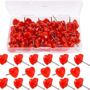 Creative red heart shaped push pins in a clear plastic box for office and DIY tasks