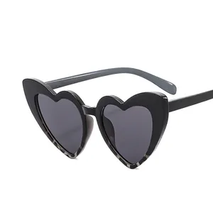 Fashion heart shaped sunglasses with black frame and dark grey lenses for women and kids