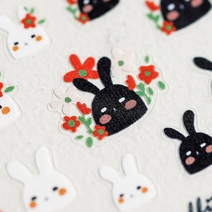 5D textured rabbit nail stickers with floral accents in black and white Japanese style