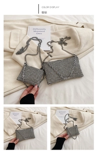 Detail showing high-shine silver rhinestone square bags in two sizes with chain straps