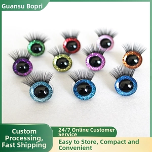 Macro shot of 3D colorful glitter doll eyes with long black eyelashes in multiple colors