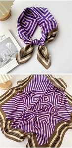 Detailed view of geometric pattern silk scarf in purple and brown for stylish neck accessory