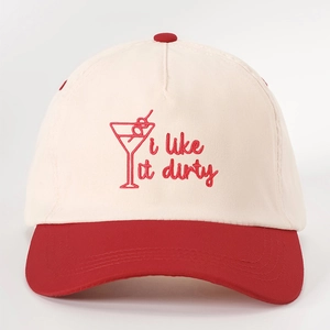 Vintage baseball cap with i like it dirty embroidery and contrast red brim on white crown