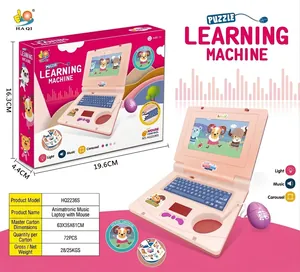 Detailed view of pink learning laptop toy with mouse and DIY stickers in product box