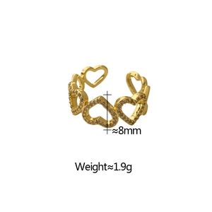 Detail of 8mm wide hollow heart ring with sparkling cubic zirconia on white background