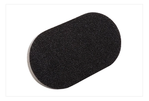 Macro detail of high-density emery sponge with abrasive texture for kitchen cleaning