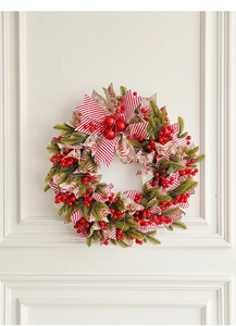 Close-up of 50cm Christmas wreath with red berries, pine needles and Joy burlap ribbon