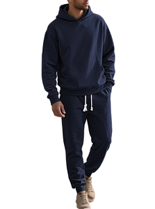 Detail of navy blue hoodie set with 3D diamond jacquard texture and white drawstrings