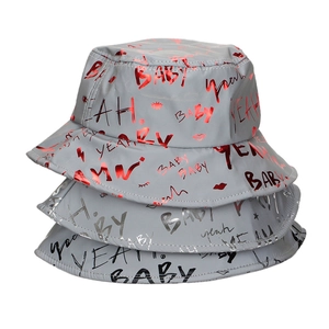 Luminous graffiti bucket hats with BABY and YEAH prints for outdoor sun protection