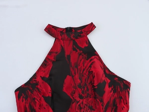 Detail of red and black jacquard halter neckline with a concealed back zipper