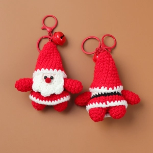 Handmade crochet Santa Claus keychain pendant with bell detail in red and white yarn