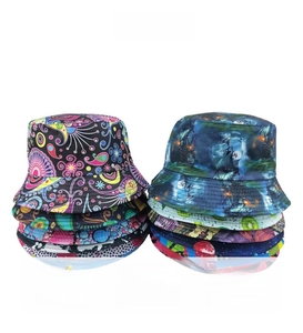 Detailed stack of double-sided bucket hats featuring psychedelic mandala and galaxy prints