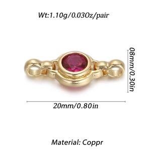 Macro view of golden copper bracelet connector featuring a round red zircon gemstone