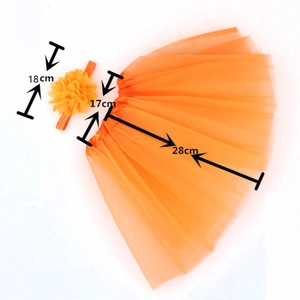 Detail view of orange tulle tutu skirt and floral headband with dimensions shown