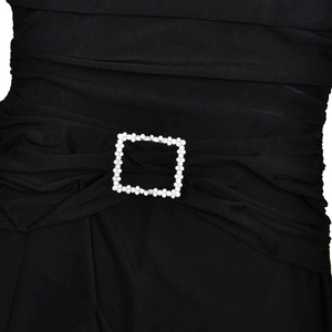 Detailed view of the gathered black waistline featuring a sparkling rhinestone buckle