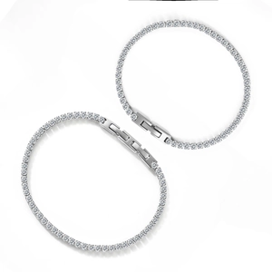 Classic silver tennis bracelet with sparkling cubic zirconia on a white background