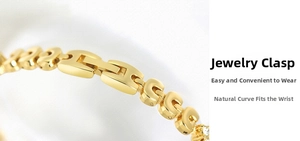 Macro shot of gold-plated metal jewelry clasp with rhinestone accents on a women's watch