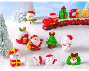 Miniature Christmas resin figurines including Santa and Snowman for DIY snow globe decor
