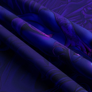 Close-up detail of smooth printed fabric with dark purple aesthetic patterns and silky texture