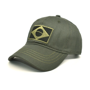Detail of army green baseball cap with Brazil flag embroidery and reinforced stitching