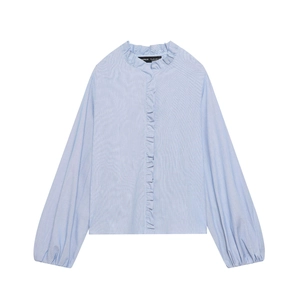 Light blue striped poplin shirt with ruffle trim and lantern sleeves on white background