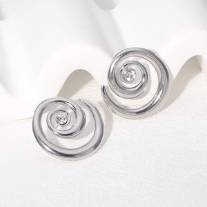 Pair of silver stainless steel spiral earrings with crystal stud in the center