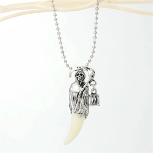 Punk style reaper death necklace with silver metal pendant and white wolf fang on bead chain