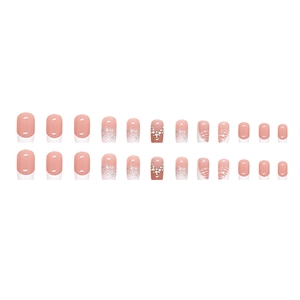 French style press-on nails set with pink glitter gradient and rhinestone accents