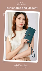 Retro deep teal leather long wallet featuring wavy stitching and vintage sunflower metal clasp