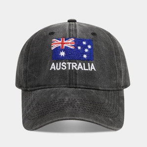 Close-up of Australia flag embroidery and white lettering on washed cotton cap