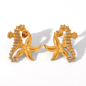 Boucles d'oreilles dorées hippocampe et étoile de mer serties de strass blancs brillants