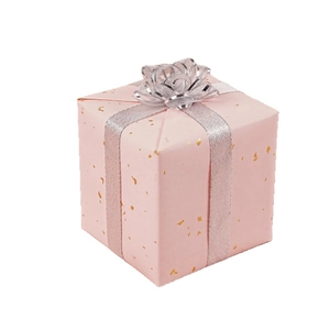 Pink gift box with silver ribbon and gold foil speckles on a clean white background
