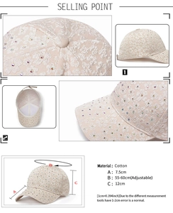 Detail of beige lace baseball cap with colorful rhinestones and cotton lining