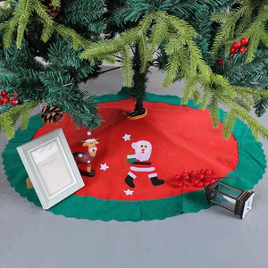 Christmas tree skirt with Santa Claus applique and green wavy edges for festive home decor