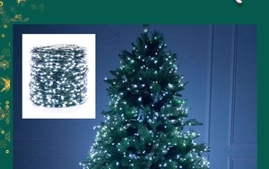 Detailed view of high-density cold white LED copper wire lights on a Christmas tree