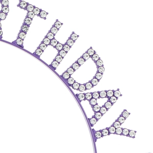 Close-up of purple metallic Happy Birthday headband with sparkling rhinestone letters