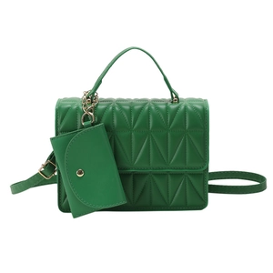 Green quilted handbag with matching coin purse and adjustable shoulder strap