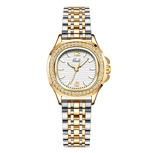 Luxury women's quartz watch with crystal-encrusted bezel and silver-gold steel bracelet