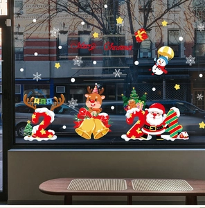 Close-up of 2024 Christmas window stickers with Santa, reindeer and festive bells