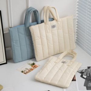 Quilted 11-15 inch iPad and laptop sleeve with handles in blue and cream white