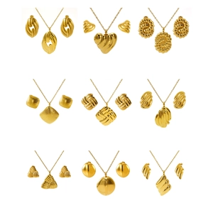 Nine sets of golden stainless steel necklace and earring jewelry in varied shapes