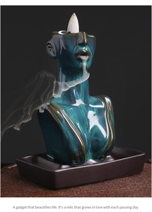 Artistic ceramic backflow incense burner showing woman bust with flowing smoke effect