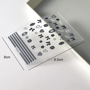 Chic 3D embossed nail art stickers with black and white camellia and bow designs